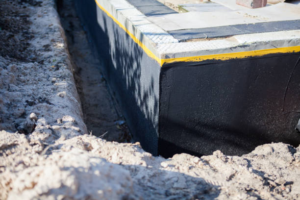 Professional Waterproofing technician working in Crittenden, KY